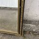 Large antique gilt mirror with scroll and shell decoration, 144 cm