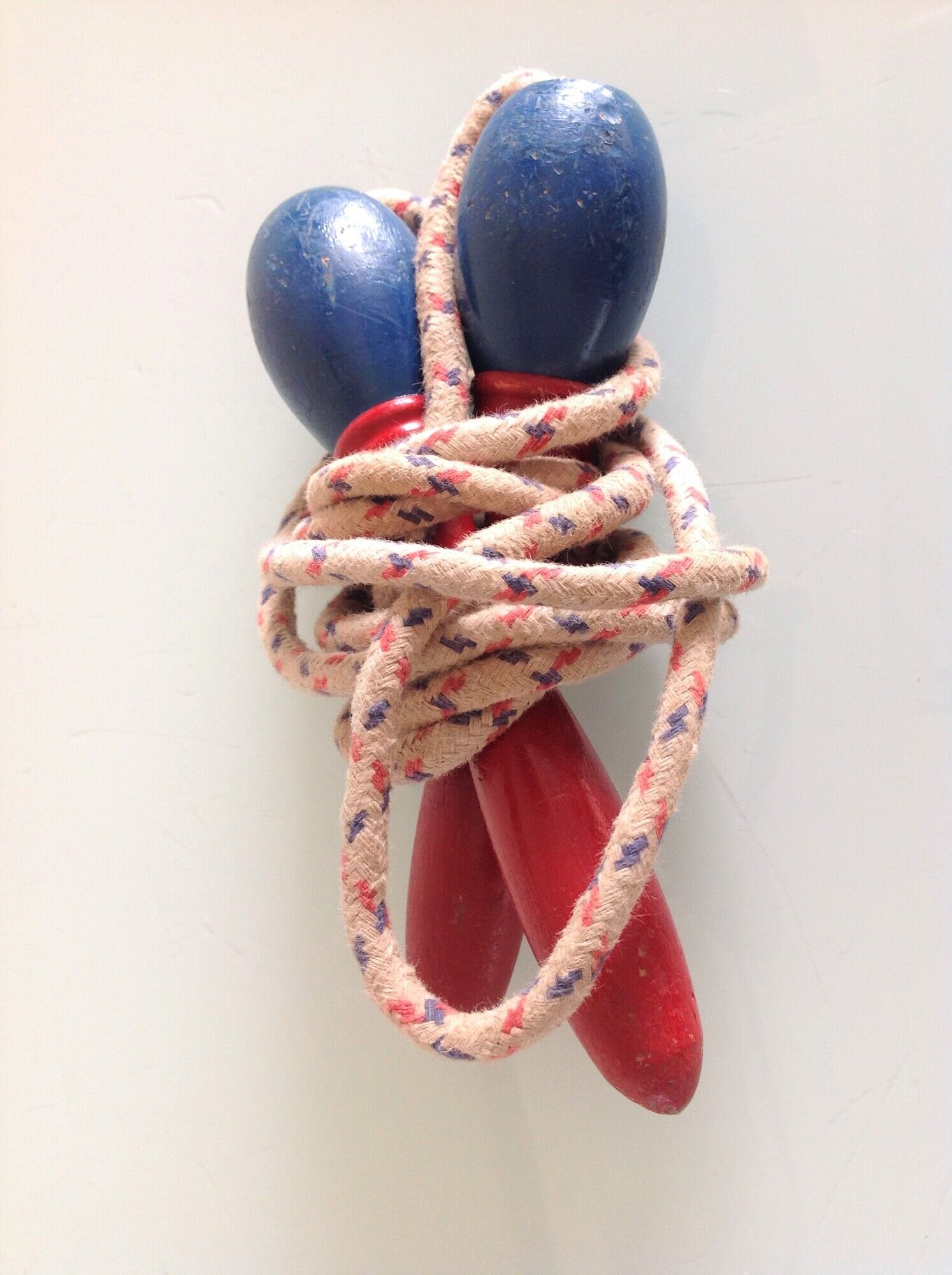 Old wooden jump rope red and blue / vintage