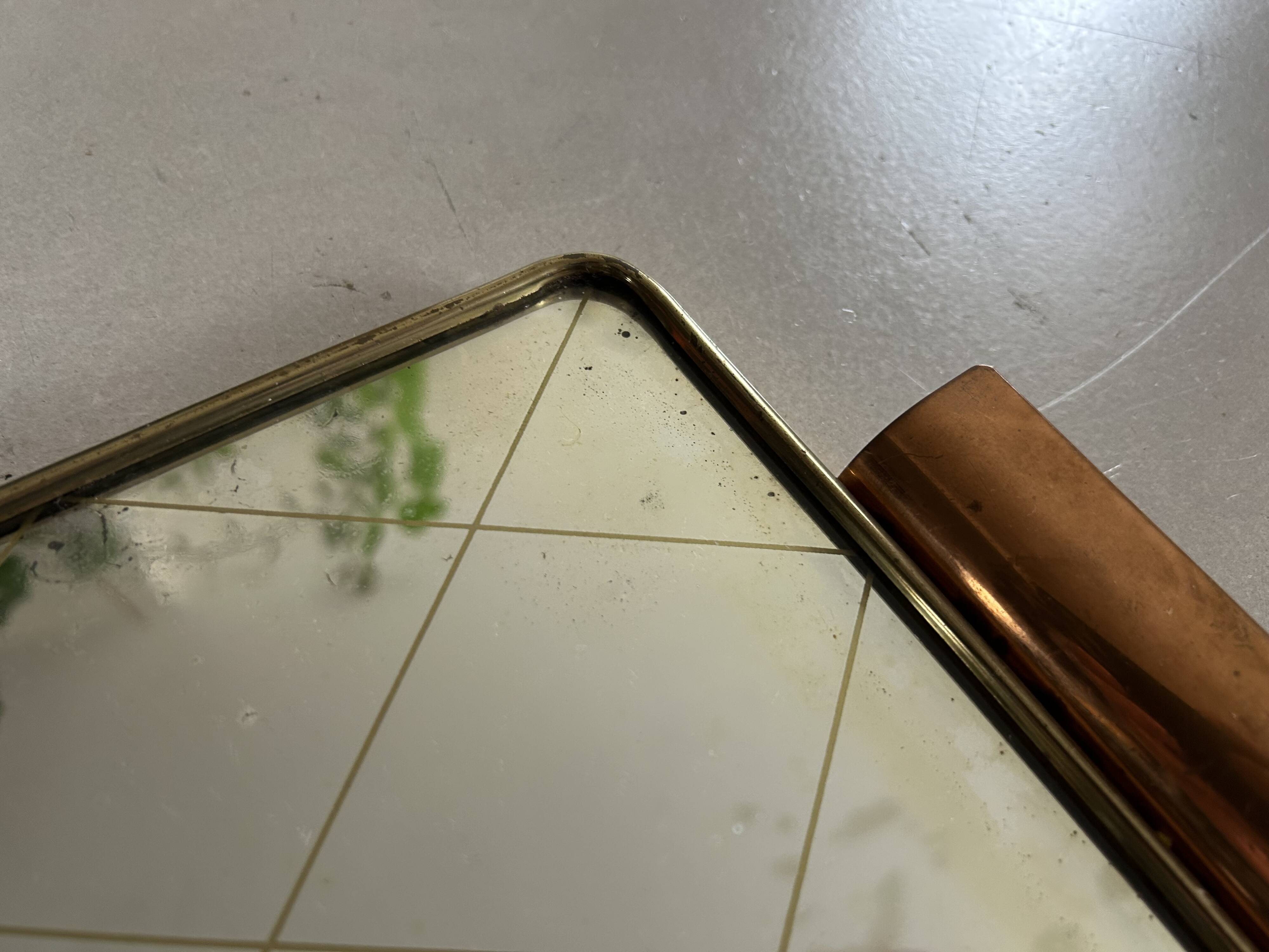 Metal tray and antique mirror