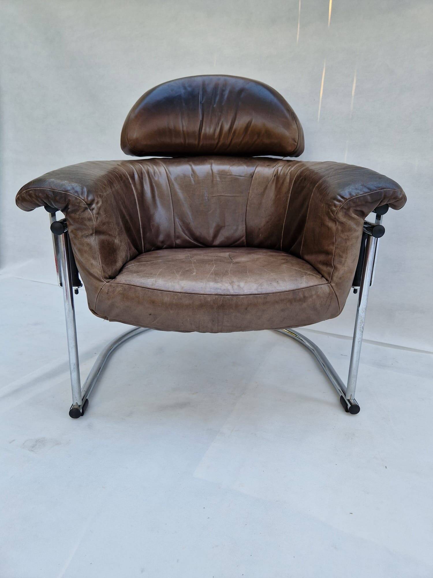 Leather armchair with tubular chrome frame, 1980s