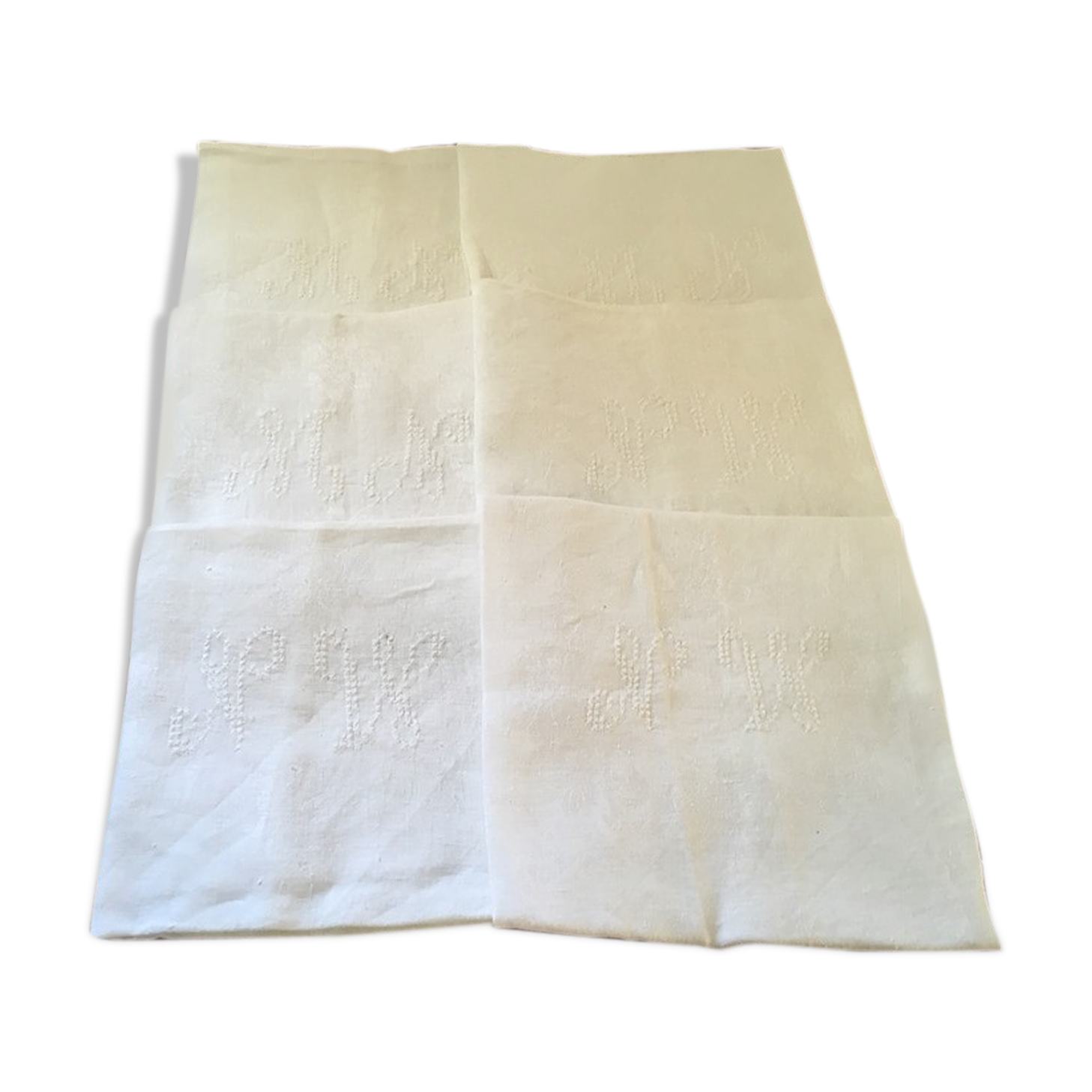 Six damask white towels and embroidered M N.