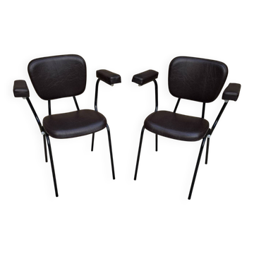 Brown faux leather armchairs