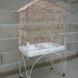 Bird cage with its wheeled holder