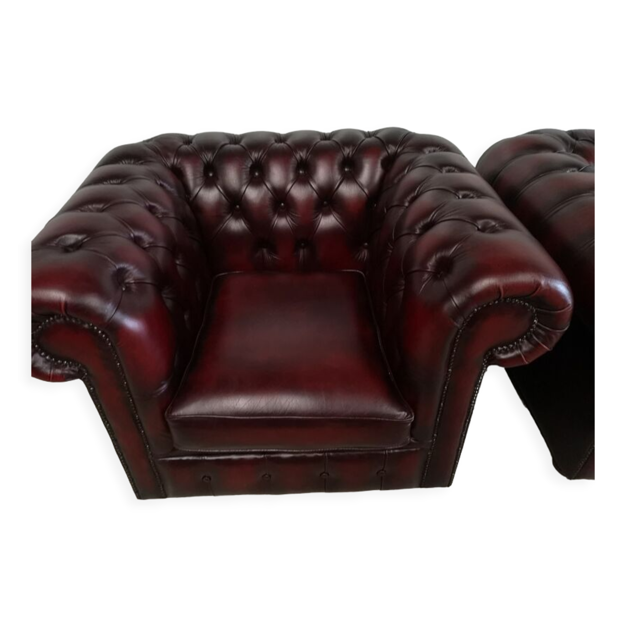 Chesterfield burgundy leather armchairs