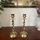 Pair of twisted brass candle holders