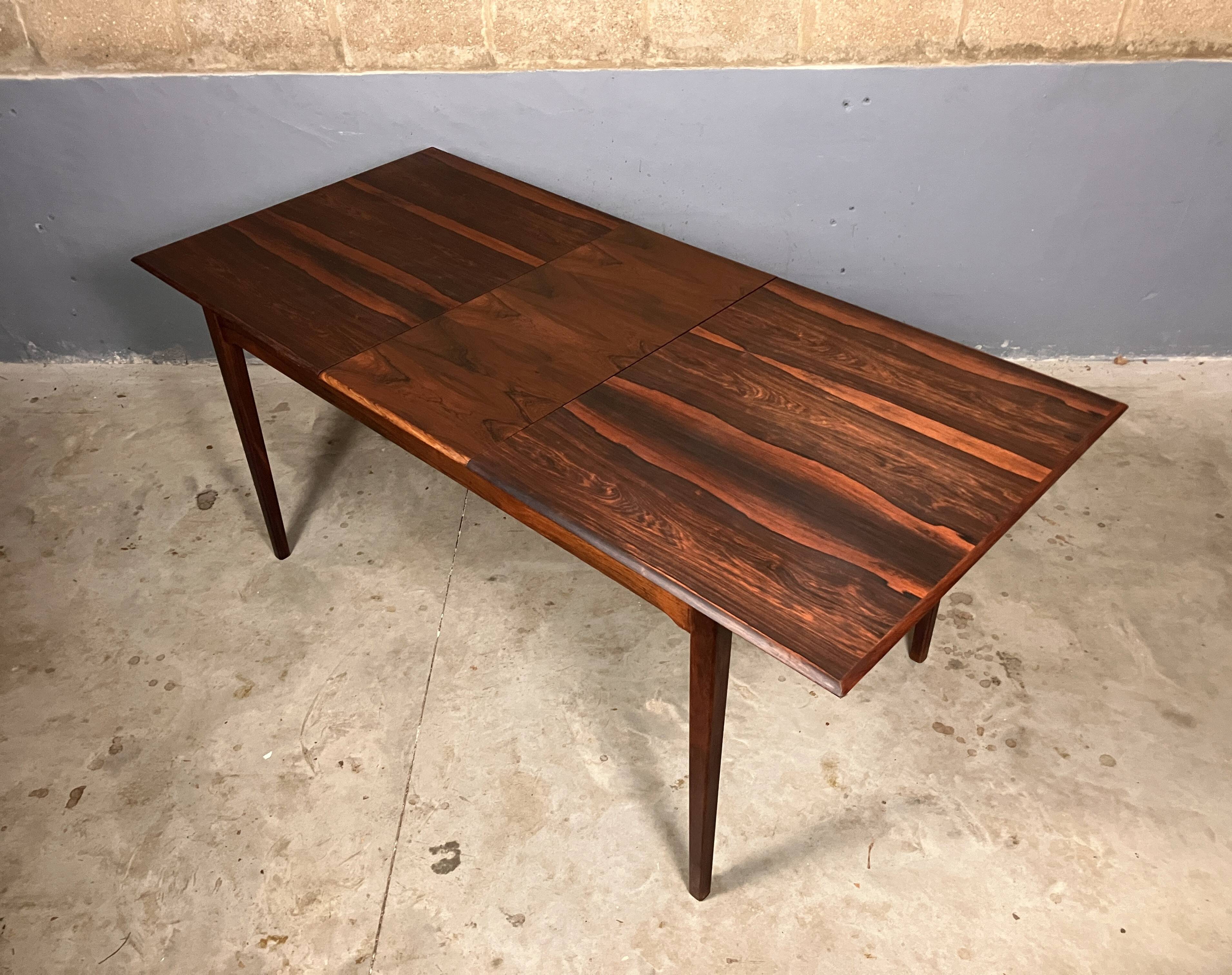 Mid-century rosewood extendable dining table