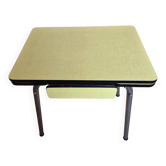 Table from the year 1960 in yellow formica.
