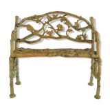 Green cast iron bench with green patina