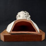 Terracotta bust of the smiling angel from Reims Cathedral with base