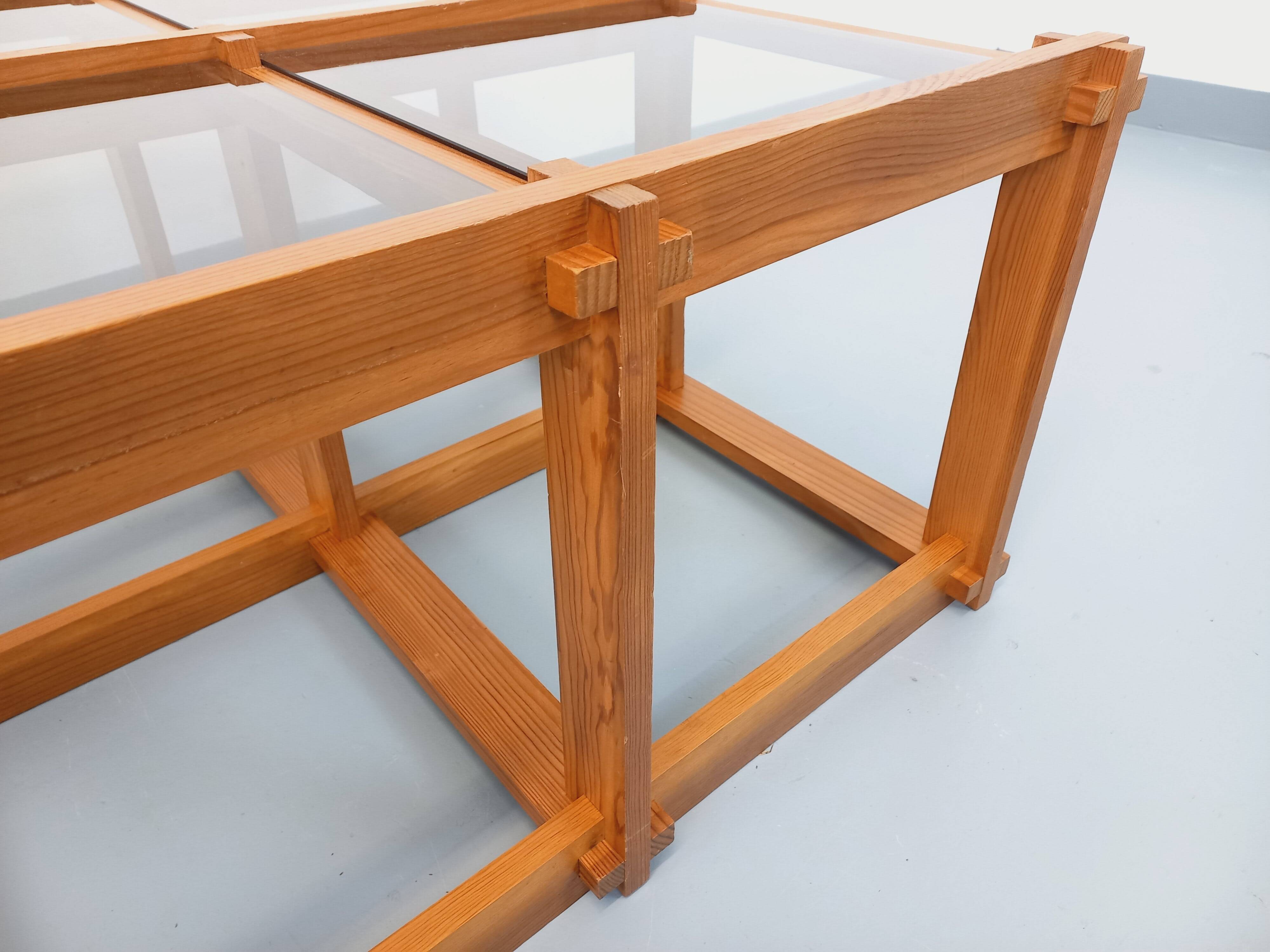 Vintage square coffee table in pine and smoked glass from the 70s and 80s.