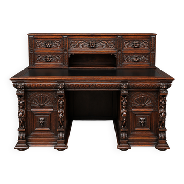 Bureau de style Renaissance ancien. Chêne massif. France. Fin du XIXe siècle.