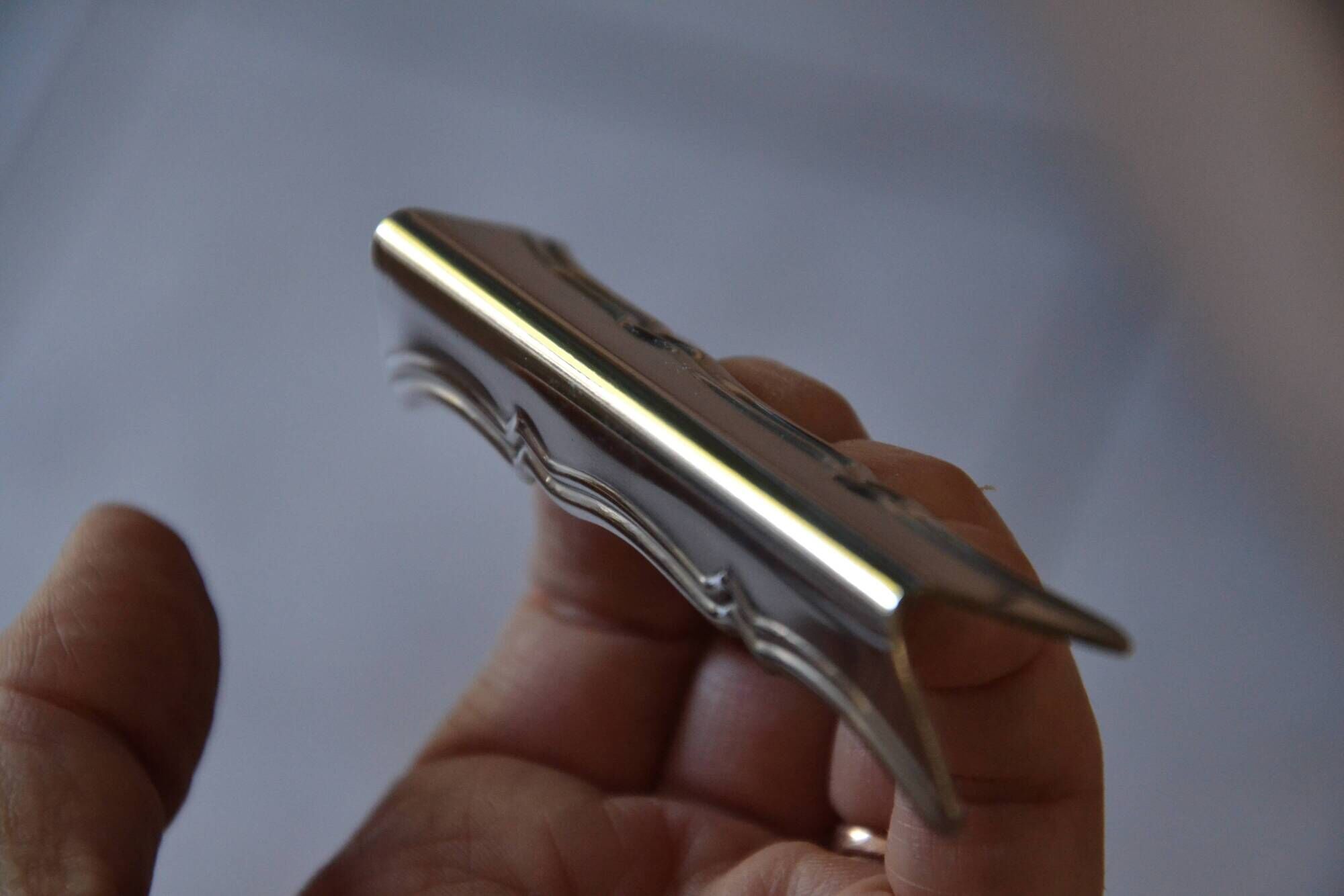 12 silver-plated knife rests