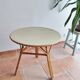 Table ronde en rotin vintage 60'