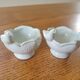 Antique porcelain egg cup/salt shaker duo