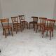 Set of 6 mismatched blond wood bistro chairs