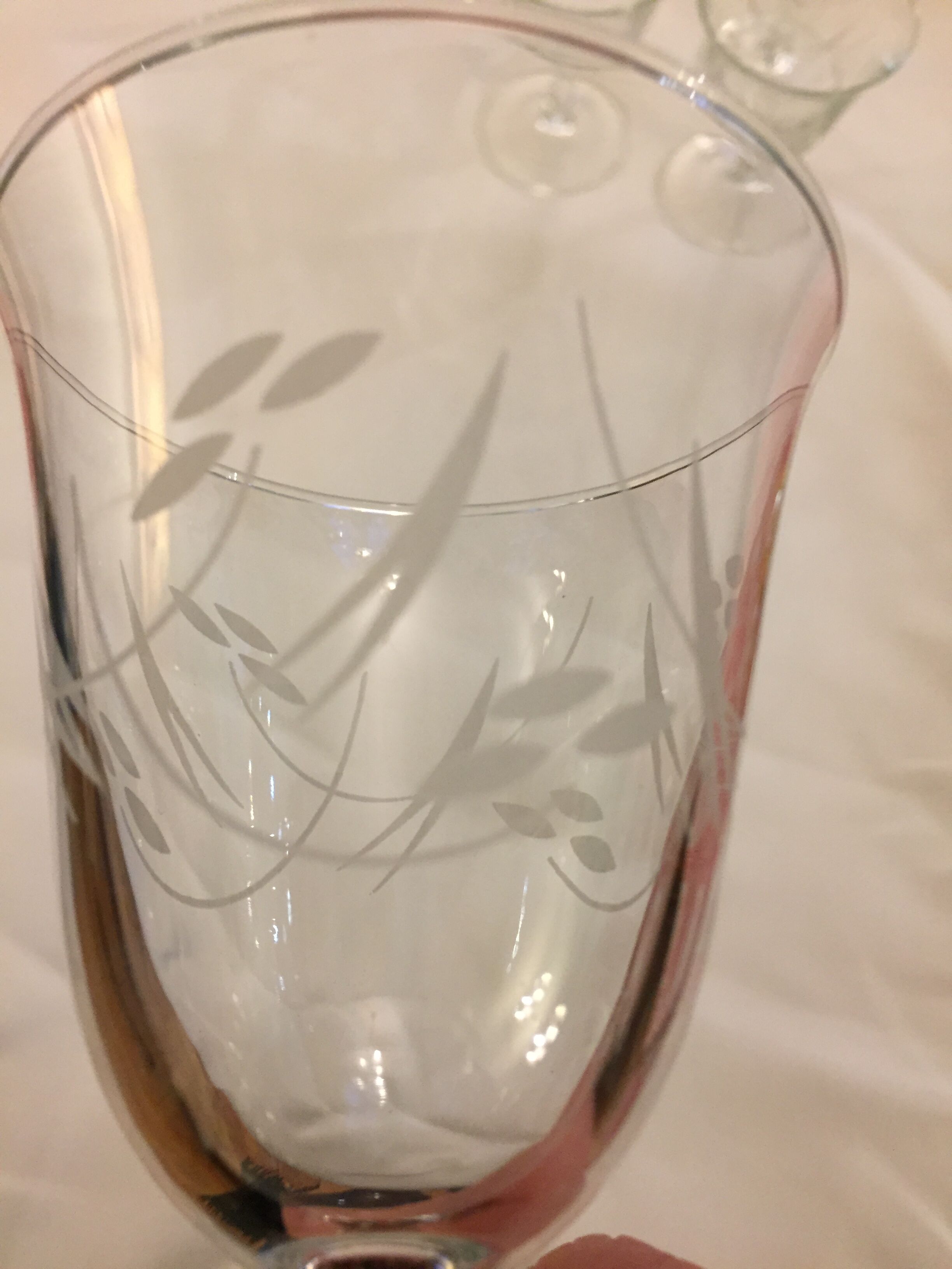 Set of six engraved wine glasses