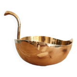 Empty brass apple pocket