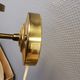 Older wall lamp, in metal, brass and milk-white glass