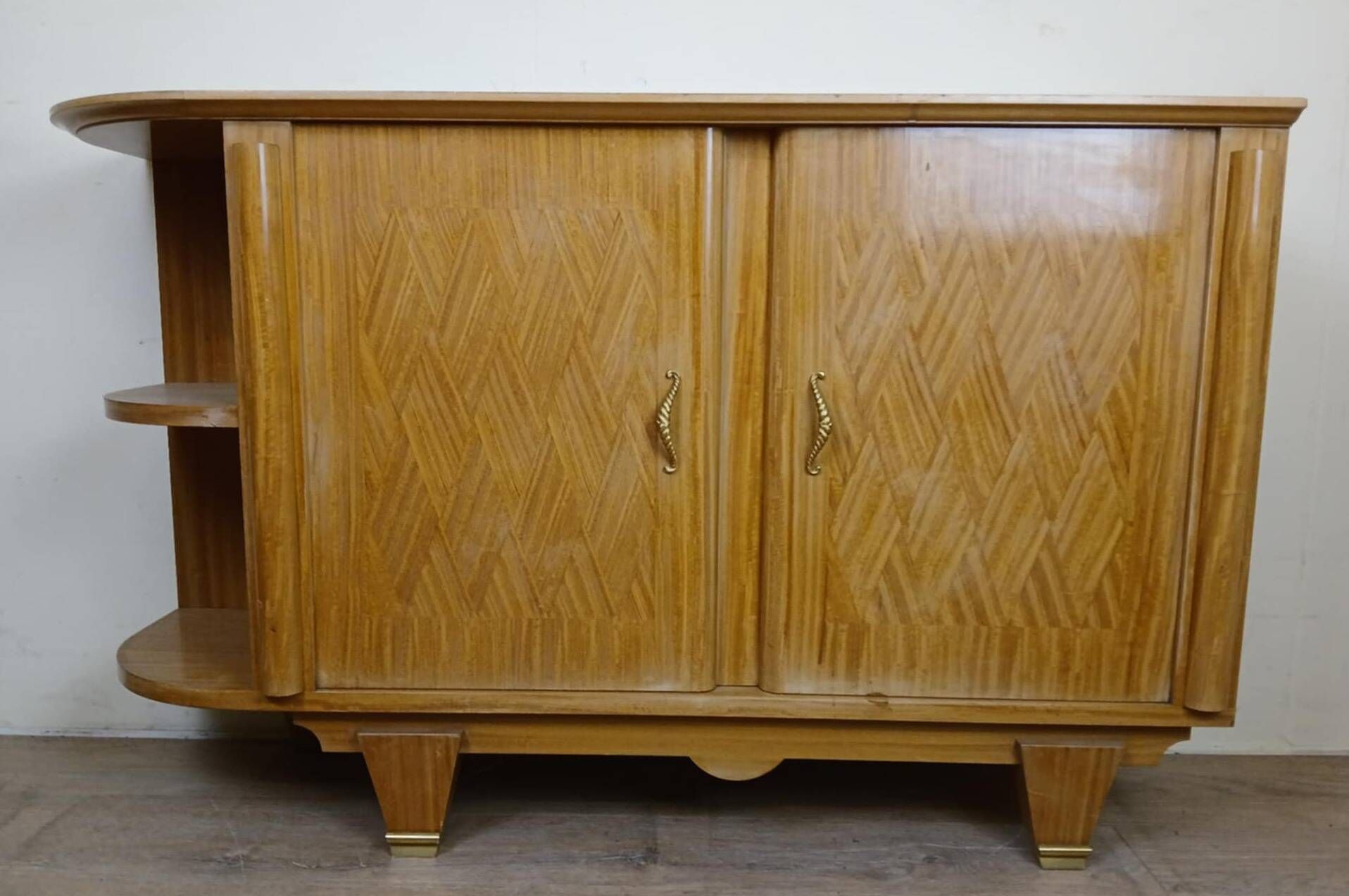 According to Jules Leleu: Rare corner sideboard in light wood, Art Deco period, circa 1930