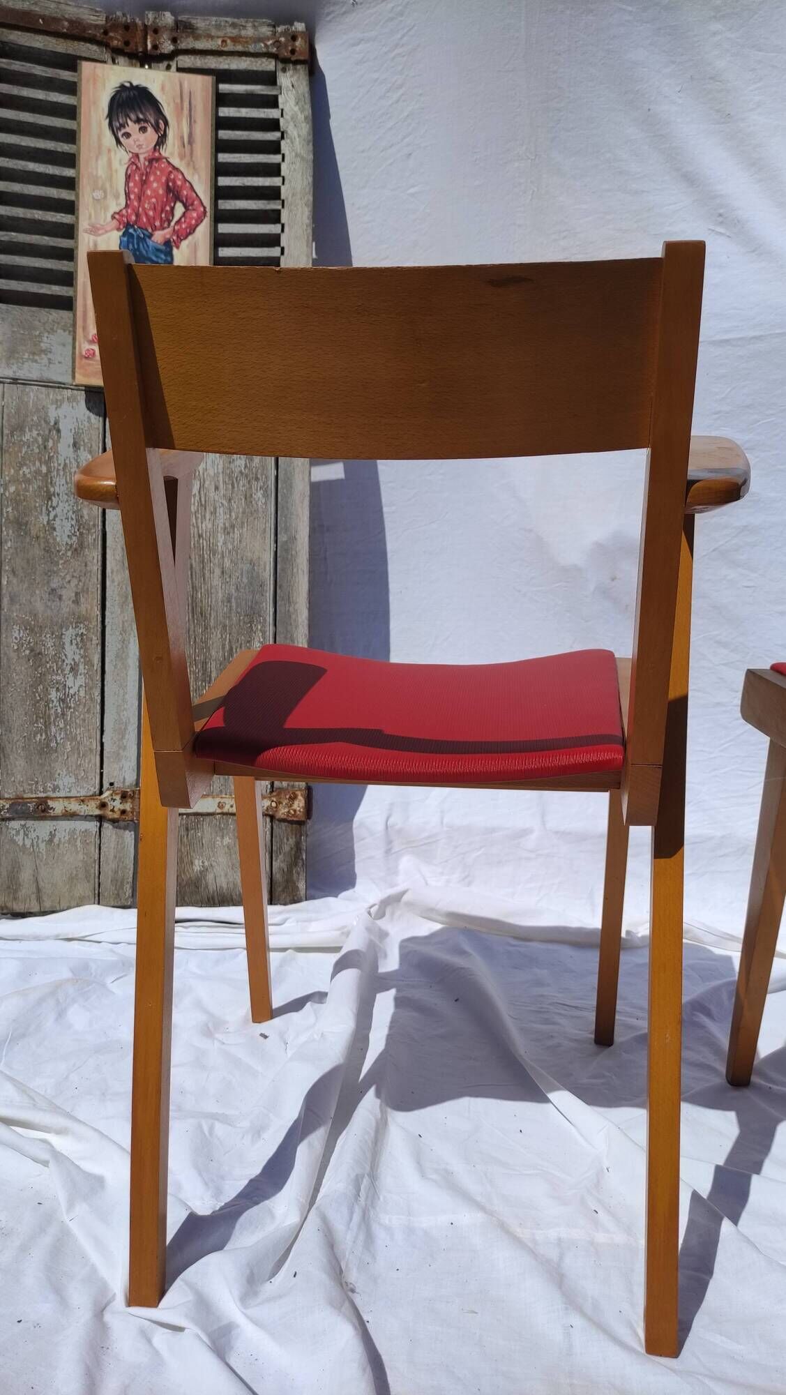 Pair of wooden armchairs and skaï foot compass of the 50s