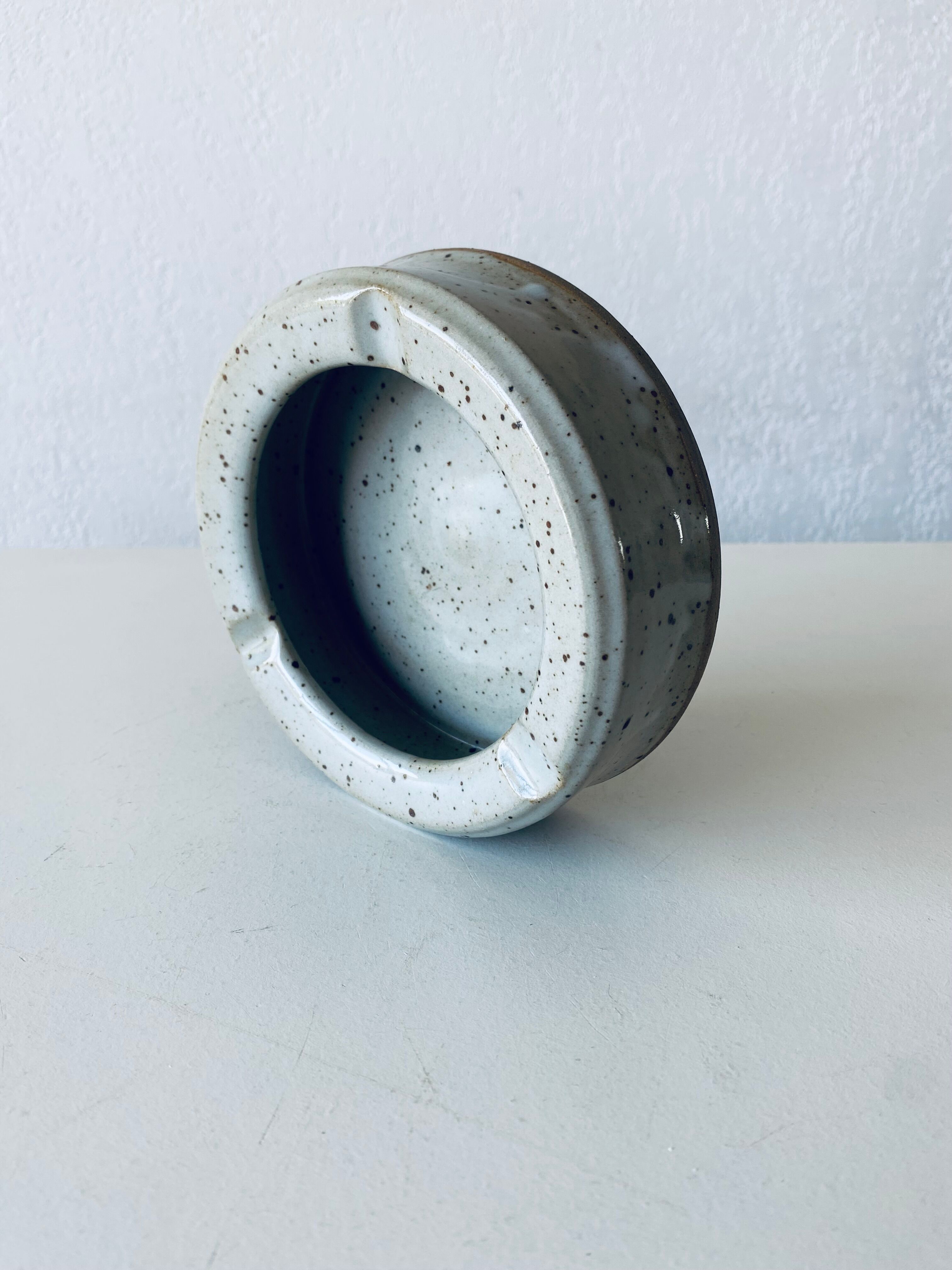 Stoneware ashtray signed Couturier