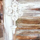 Vintage shutter renovated into a coat rack