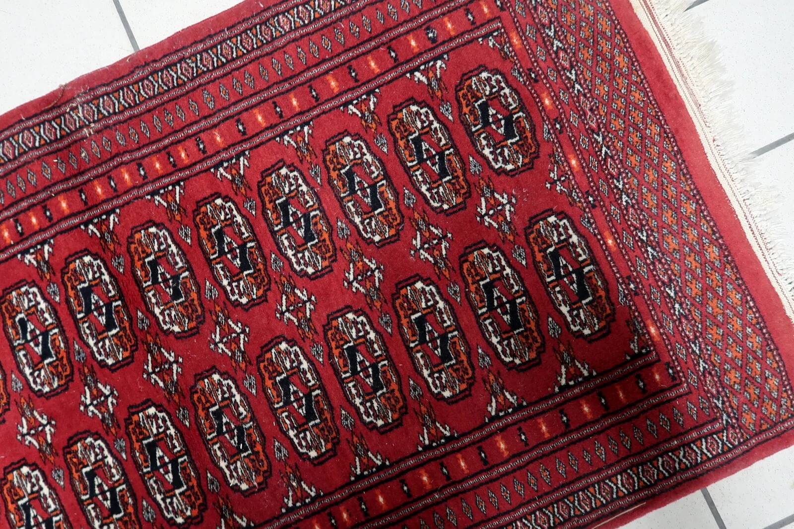 Handmade vintage Uzbek Bukhara rug 86cm x 125cm, 1960s
