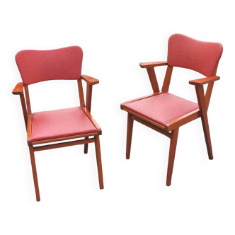 Pair of vintage beech and red skai armchairs from the 1950s