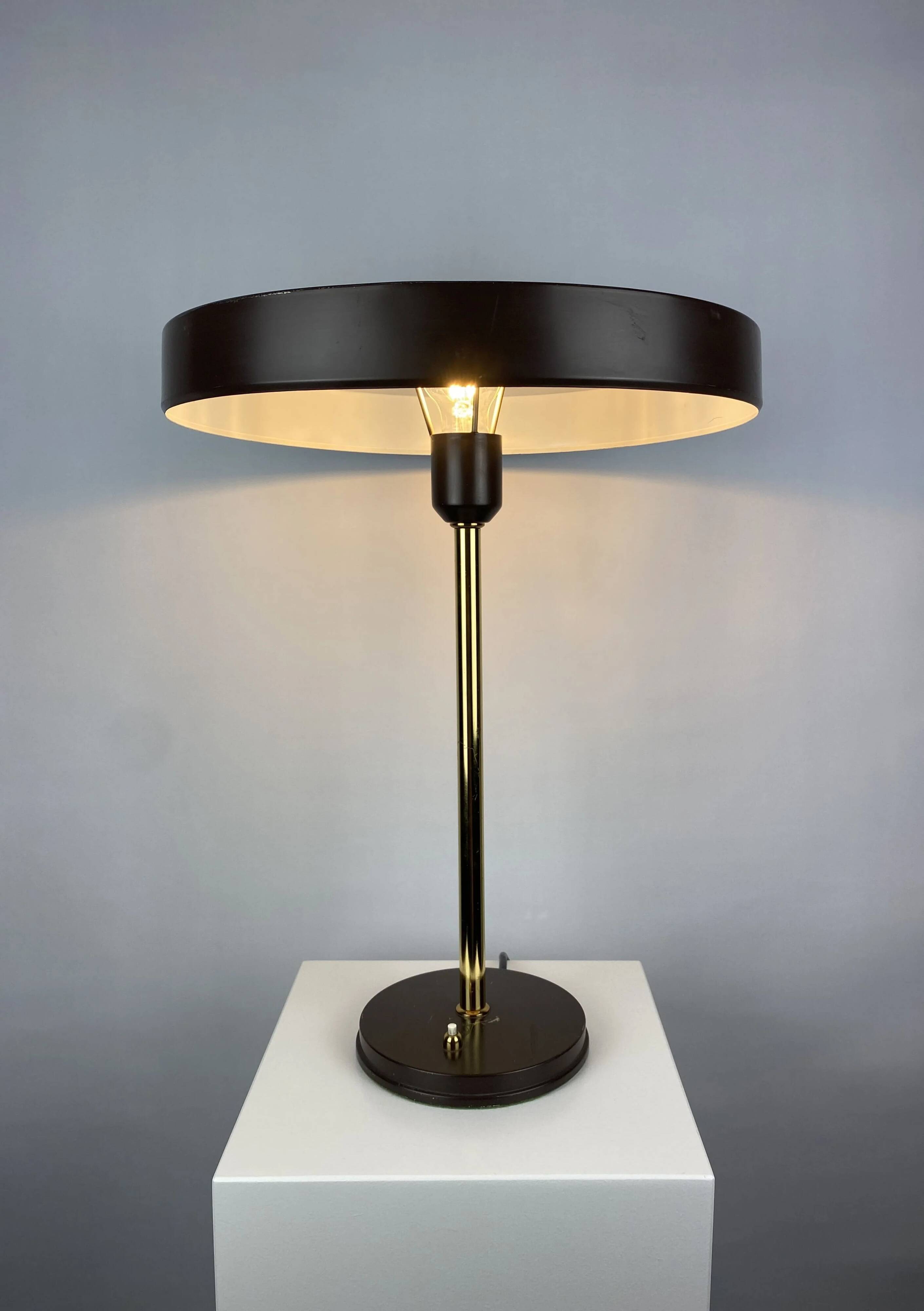One of the four brown and gold Timor 69 table lamps by Louis Kalff for Philips 1970.