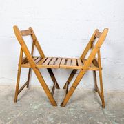 Pair of wooden folding chairs
