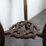 Carved selette with chimera decoration