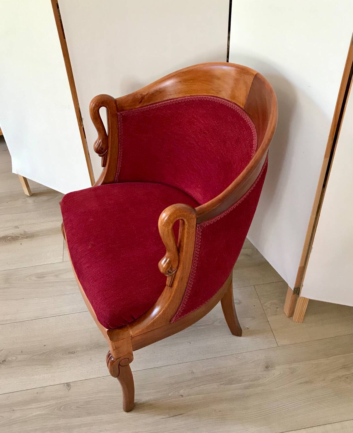 Empire-style armchair with swan necks