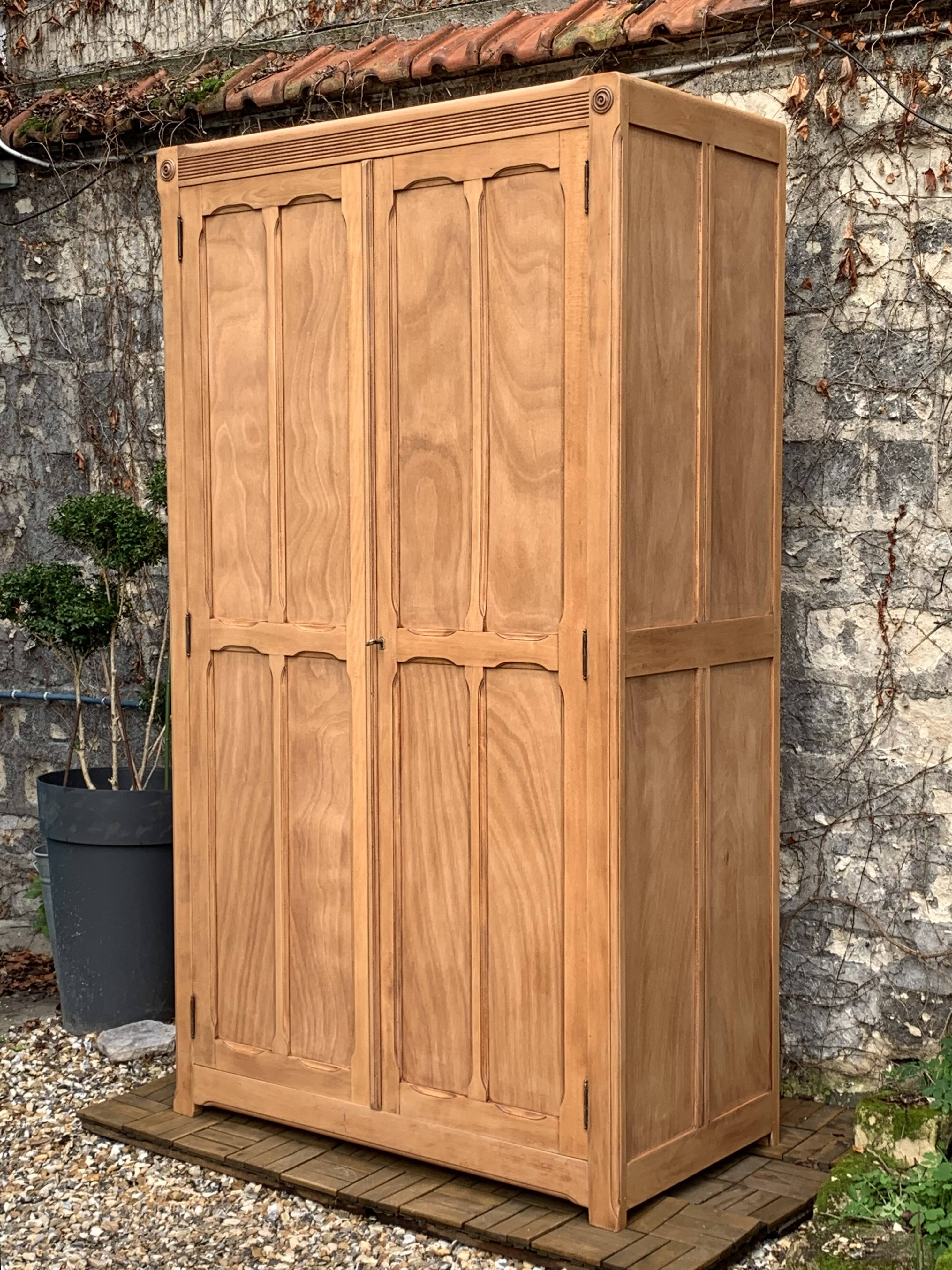 Parisian paneled cabinet in raw wood, 1940