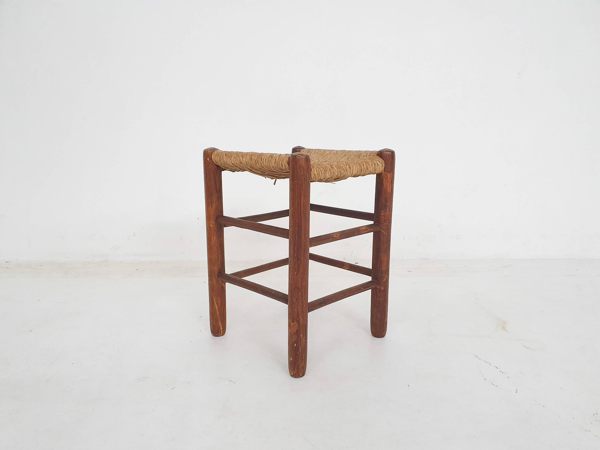 Mid-century wooden stool with rattan seating