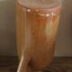 Vintage stoneware liqueur bottle with handle