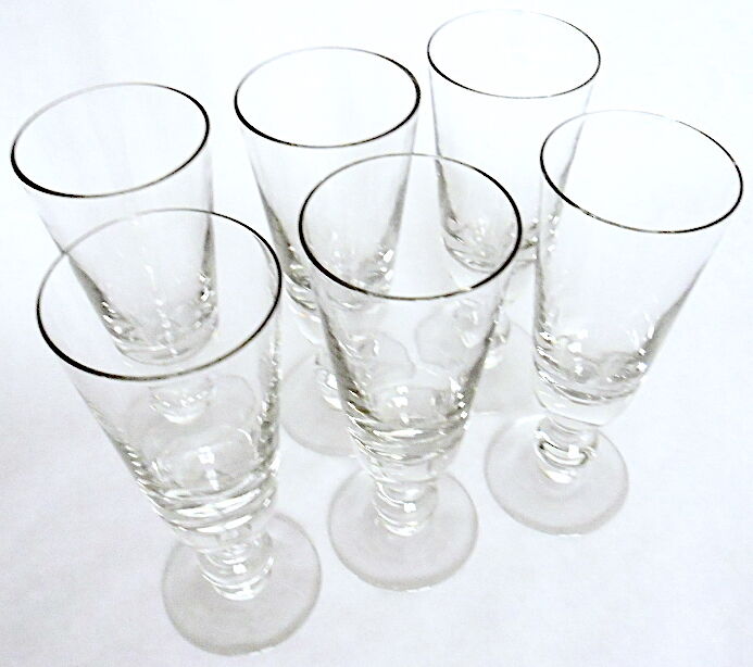 Suite of six former crystal champagne flutes
