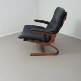 2 x Scandinavian black leather lounge chairs