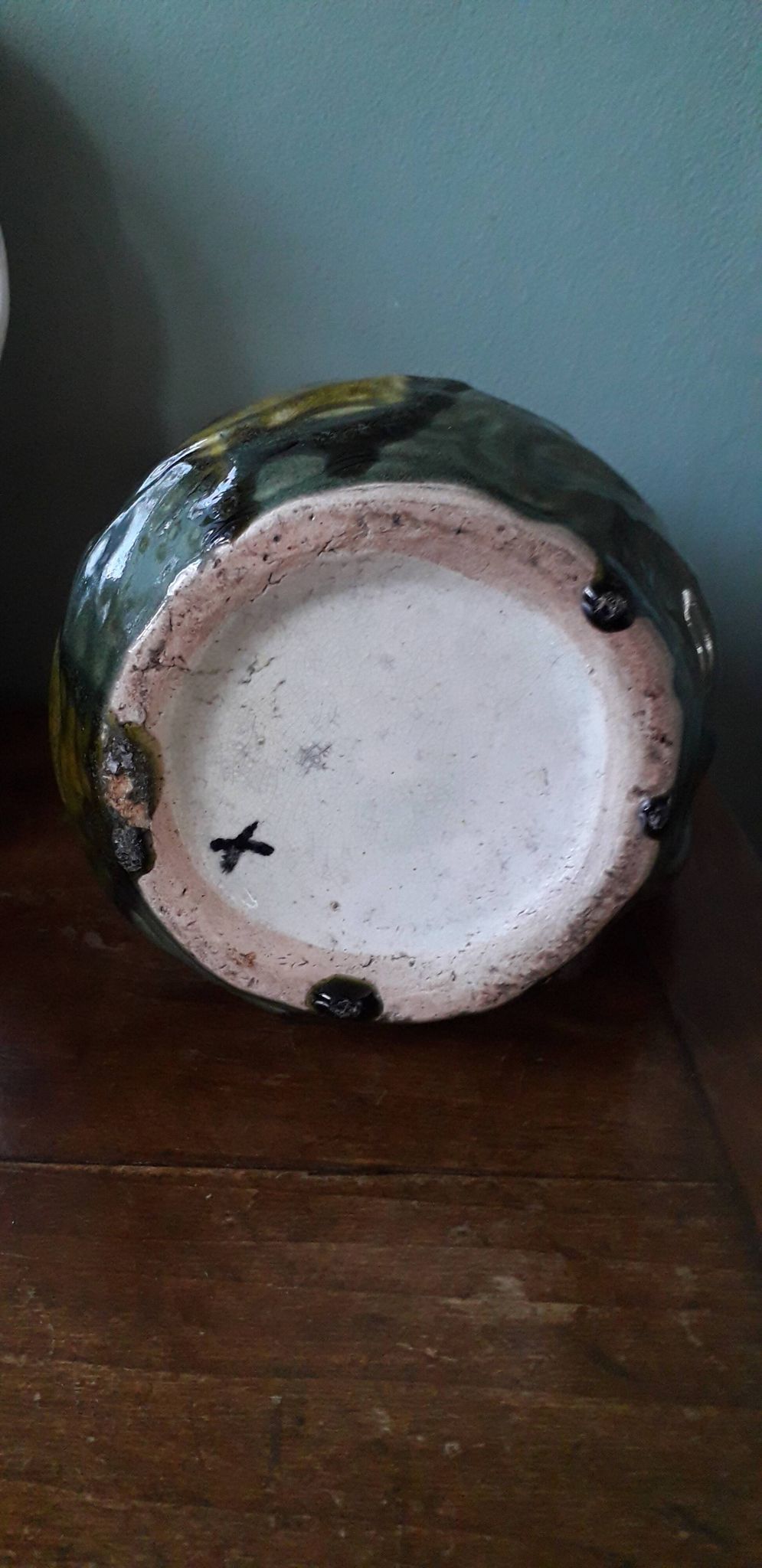 Vintage barbotine pitcher with floral decoration