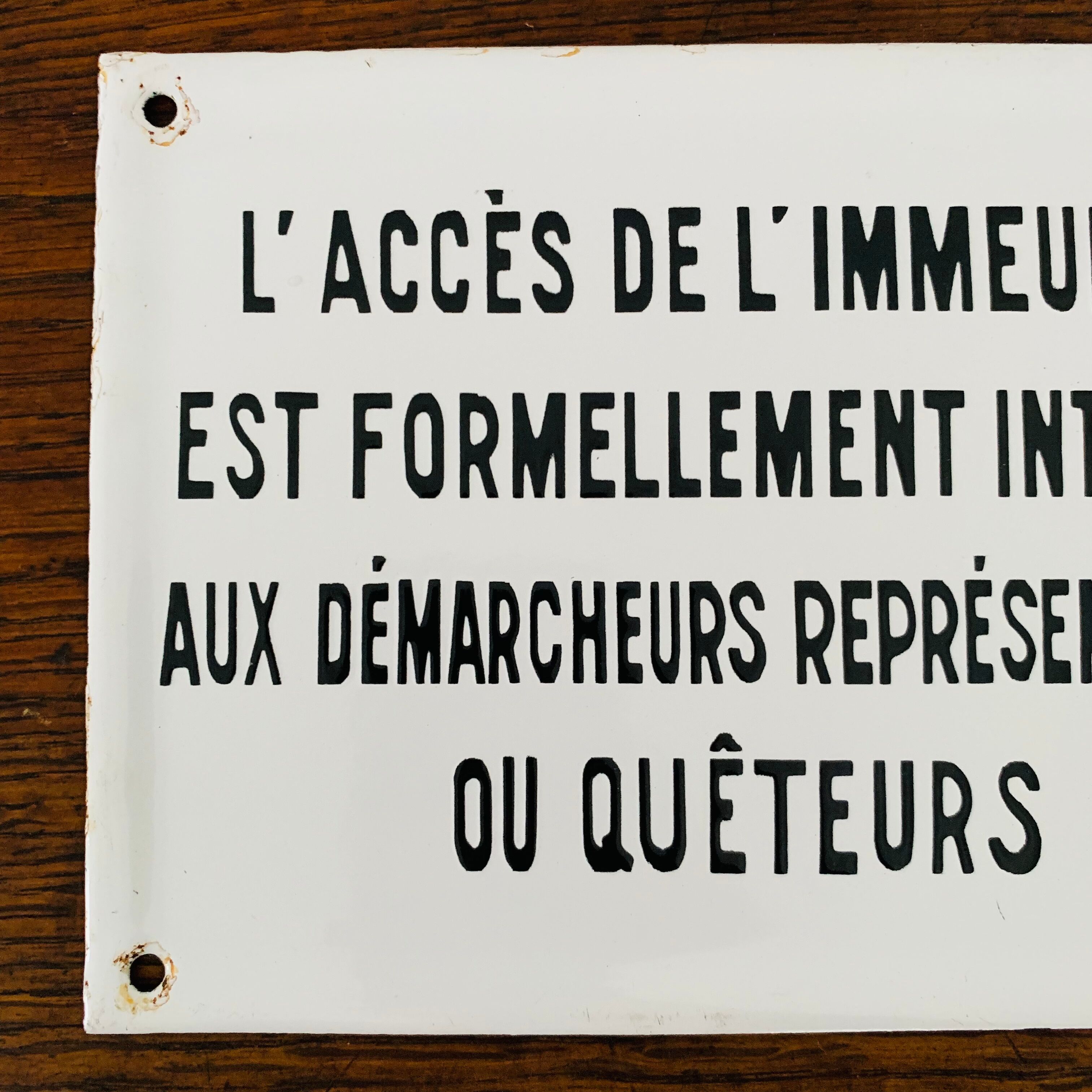 Old enamelled plaque of building