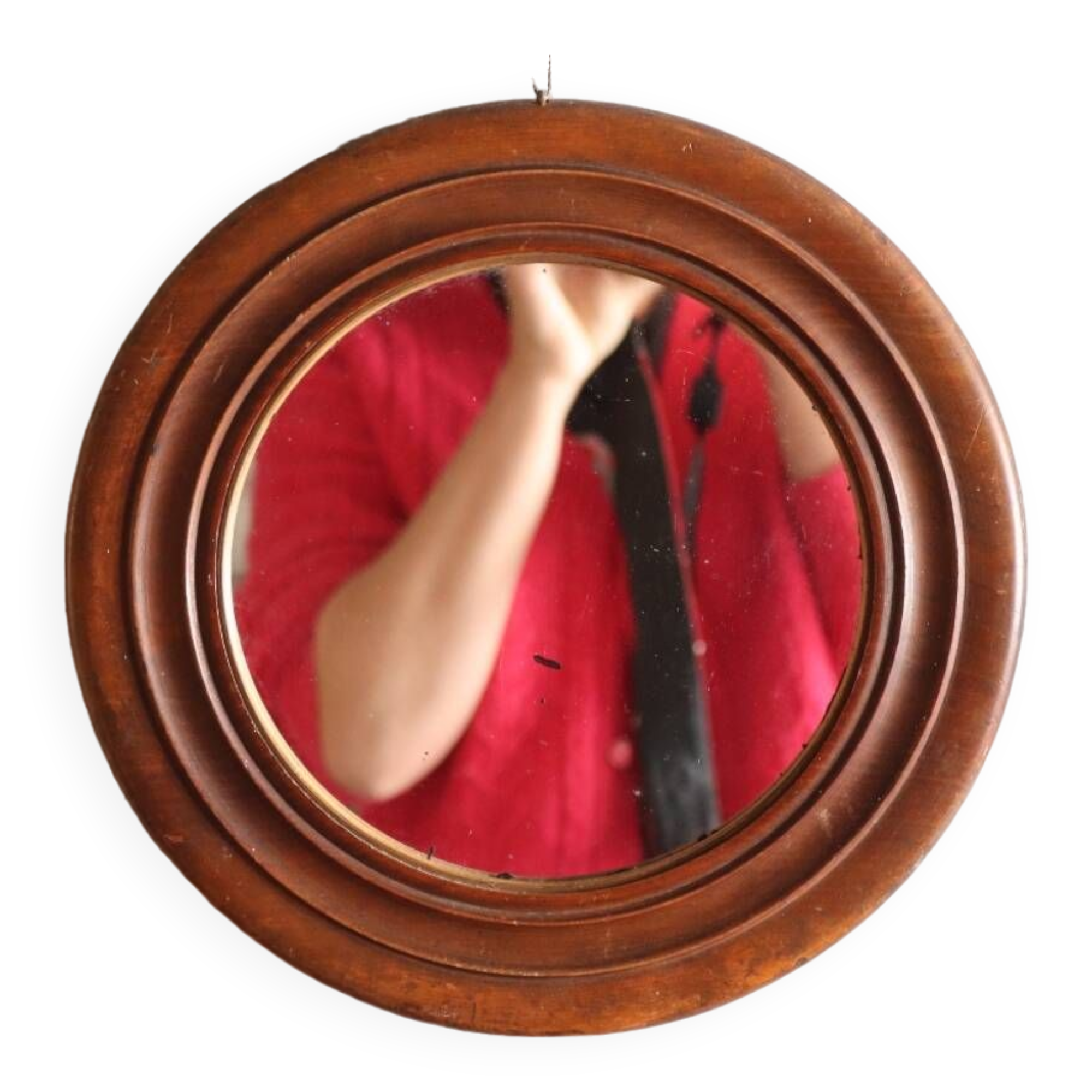 Round old wooden mirror