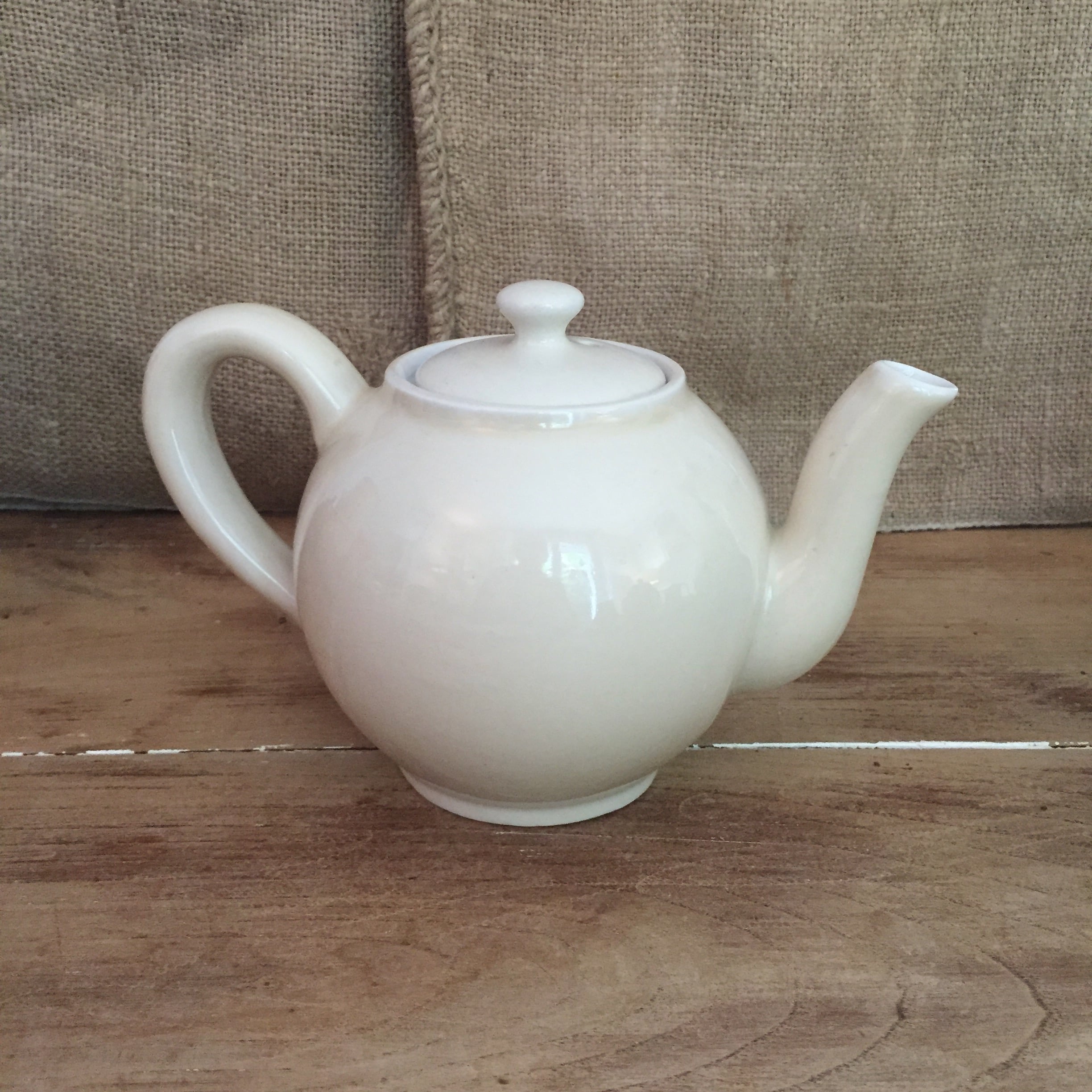 Teapot and vintage milk jar