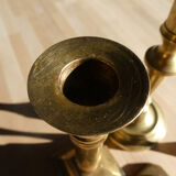 Set of 4 old candle holders in golden brass