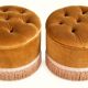 False pair of round Napoleon III poufs in ochre velvet, tufted with fringes.