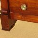 Crossed walnut chest of drawers
