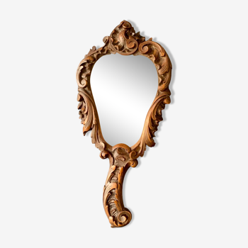 Miroir à main ancien en bois sculpté