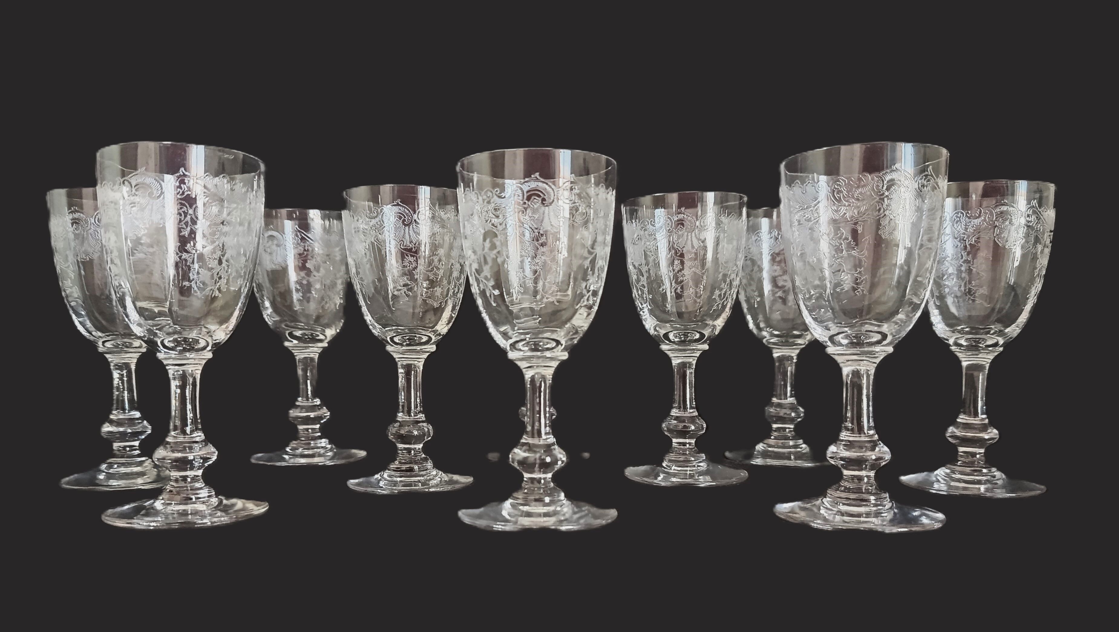 9 crystal white wine glasses from St. Louis model Cléo and their decanter.