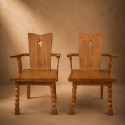 Pair of brutalist armchairs, oak, France, circa 1950.