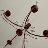 Deep red tassel and wrought iron chandelier