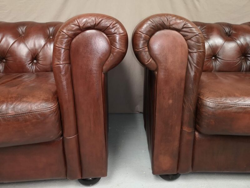 Brown brown leather chesterfield armchairs