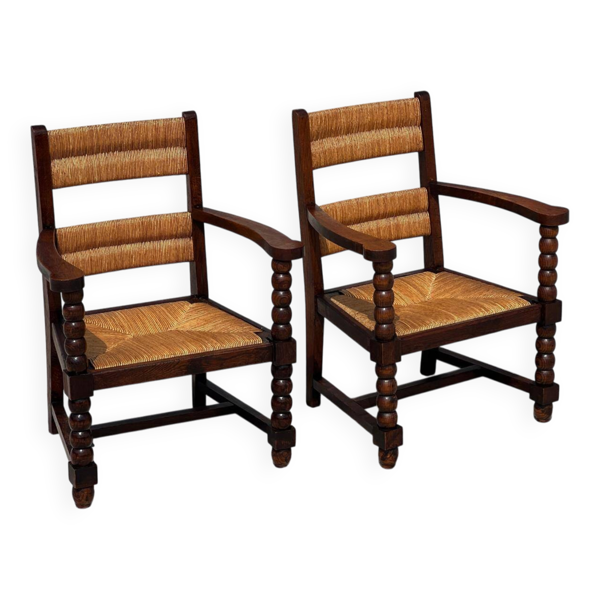 Pair of stained oak and straw armchairs, French work, 1950